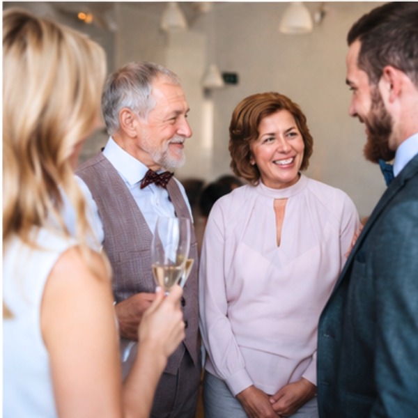 Guests chatting over drinks